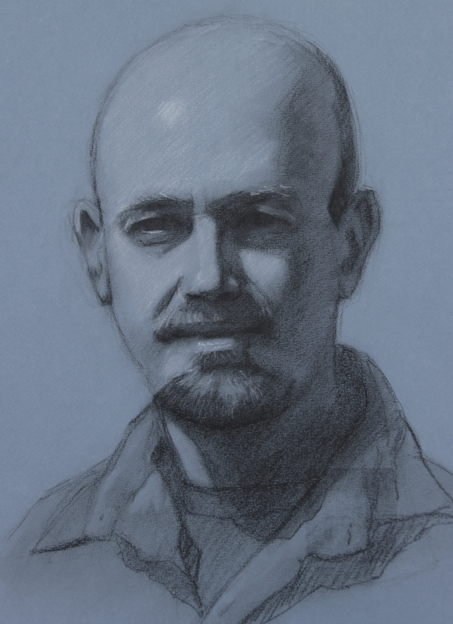 Charcoal drawing of Joe on blue tinted paper by Gio Argentati